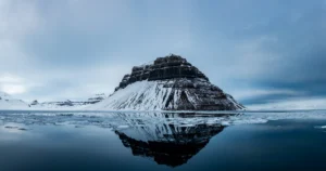 Melting sea ice and snow-covered mountains at the entrance to Billefjorden, Svalbard, in the high Arctic